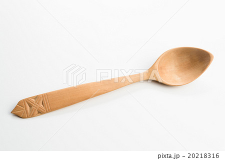 Wooden spoon on white background 20218316