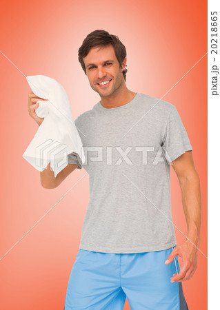 Composite image of portrait of a fit young man with towel Composite image of portrait of a fit young man with towel 20218665