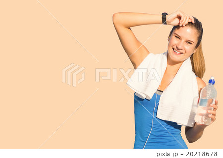 Composite image of fit woman with water 20218678