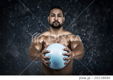 Composite image of muscular man working out with weight 20218680
