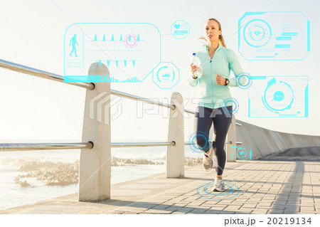 Composite image of focused fit blonde jogging at promenade 20219134