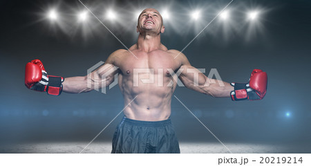 Composite image of boxer with arms outstretched 20219214