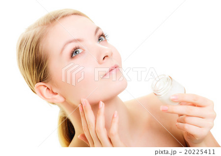 Skin care. Girl applying moisturizing cream Skin care. Girl applying moisturizing cream 20225411