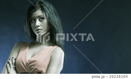 mixed race girl portrait on blue 20226104