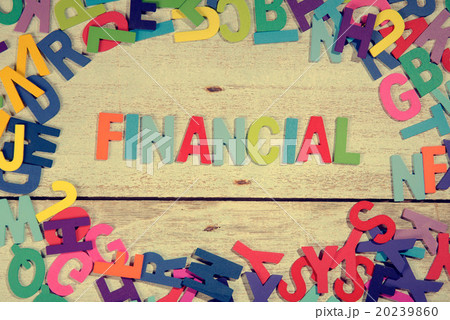 financial word block concept photo on plank wood 20239860