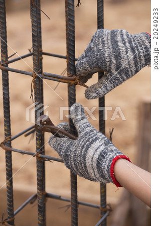 construction worker hands working with pincers construction worker hands working with pincers 20249233