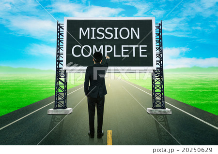 businessman standing on road and pointing with large sign of mis 20250629