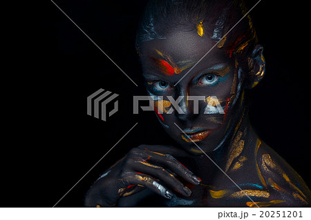 Portrait of a young woman who is posing covered Portrait of a young woman who is posing covered 20251201