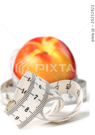 Tape measure and nectarine 20252922