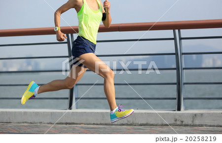 young fitness woman runner running at seaside 20258219