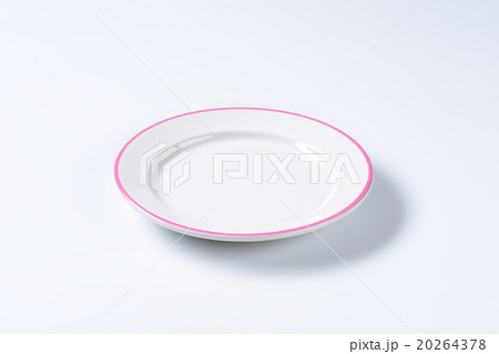 Empty rimmed dinner plate Empty rimmed dinner plate 20264378
