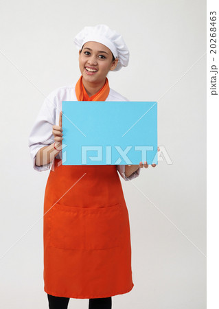 woman chef holding card woman chef holding card 20268463