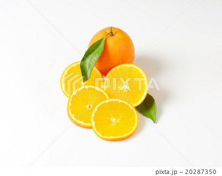 Fresh ripe oranges with leaves Fresh ripe oranges with leaves 20287350
