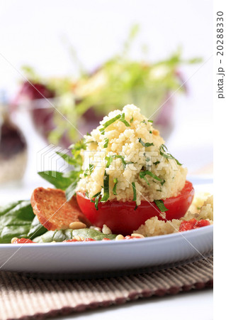 Couscous stuffed tomato Couscous stuffed tomato 20288330