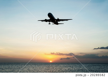 Plane with sky sunset and sea Plane with sky sunset and sea 20289382