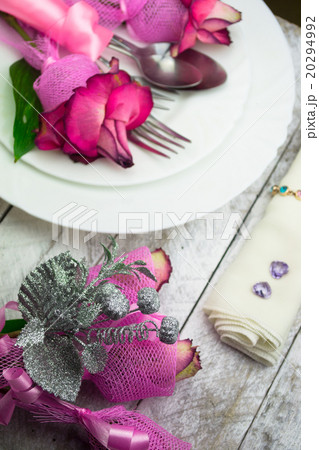 Holiday romantic table setting with pink roses 20294992