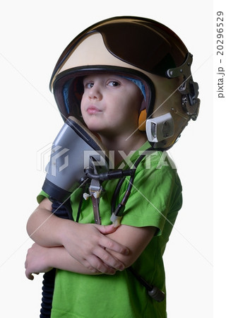Funny little child in fighter pilot helmet isolated on white background Funny little child in fighter pilot helmet isolated on white background 20296529