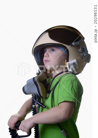 Funny little child in fighter pilot helmet isolated on white background Funny little child in fighter pilot helmet isolated on white background 20296531