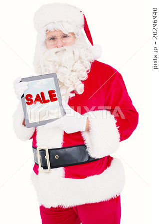 Composite image of happy santa showing digital tablet Composite image of happy santa showing digital tablet 20296940