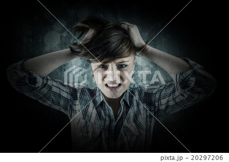 Composite image of pretty brunette shouting with hands on head Composite image of pretty brunette shouting with hands on head 20297206