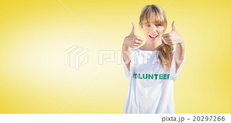 Composite image of natural blonde wearing a volunteering t shirt 20297266