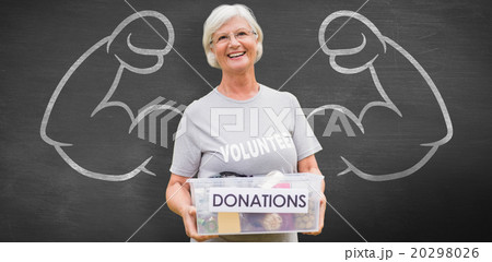 Composite image of happy grandmother holding donation box Composite image of happy grandmother holding donation box 20298026