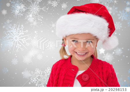 Composite image of cute little girl wearing santa hat Composite image of cute little girl wearing santa hat 20298153
