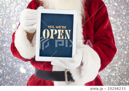 Composite image of santa claus showing tablet pc Composite image of santa claus showing tablet pc 20298233