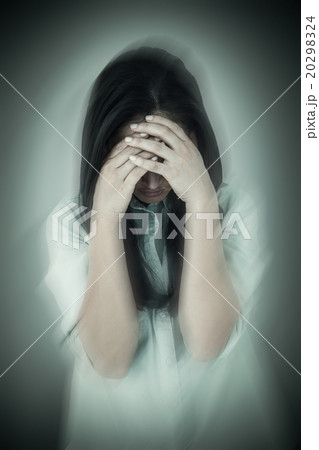 Composite image of troubled woman crying Composite image of troubled woman crying 20298324