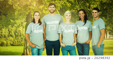 Composite image of volunteers friends smiling at the camera 20298392