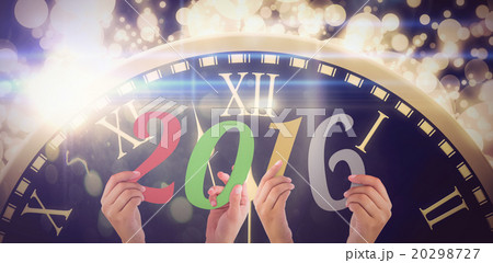 Composite image of hands showing 2016 20298727