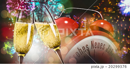 Composite image of champagne glasses clinking Composite image of champagne glasses clinking 20299376
