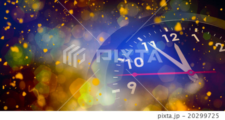 Composite image of countdown to midnight on clock 20299725