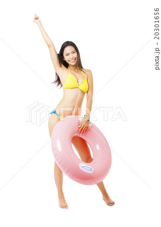 sexy female in bikini holding swimming ring sexy female in bikini holding swimming ring 20301656