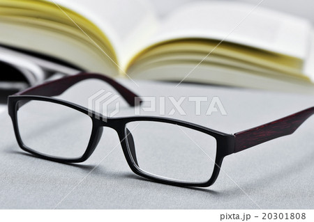 eyeglasses and open book 20301808
