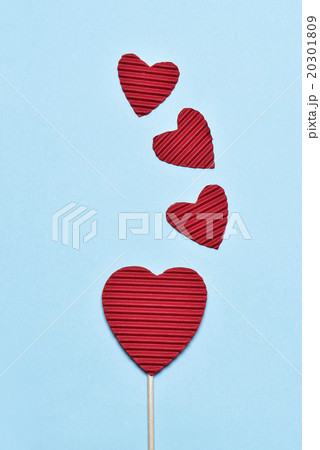 red hearts on a blue background 20301809