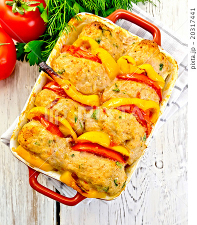 Cutlets of turkey in pan on light board top 20317441