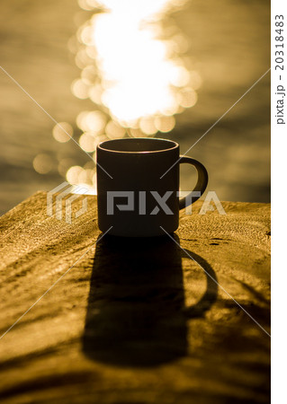 Silhouettes of morning coffee on the lake. Silhouettes of morning coffee on the lake. 20318483
