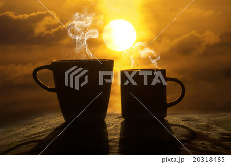 Silhouettes of morning coffee on the lake. 20318485