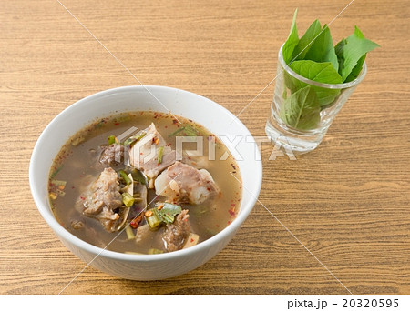 Thai Spicy and Sour Beef Entrails Soup with Basil Thai Spicy and Sour Beef Entrails Soup with Basil 20320595