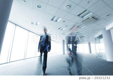 Blurry portrait of walking businessman 20321232