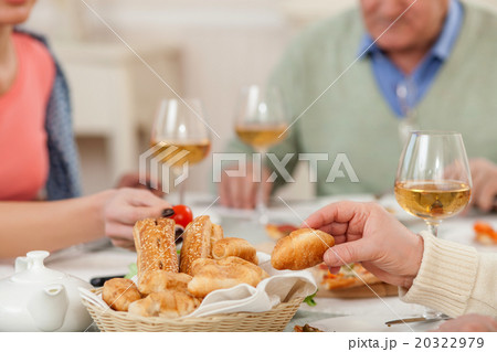 Pretty relatives are dining together at home Pretty relatives are dining together at home 20322979