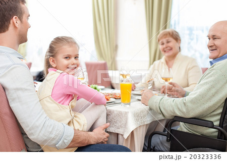 Pretty relatives have a lunch in cafe 20323336