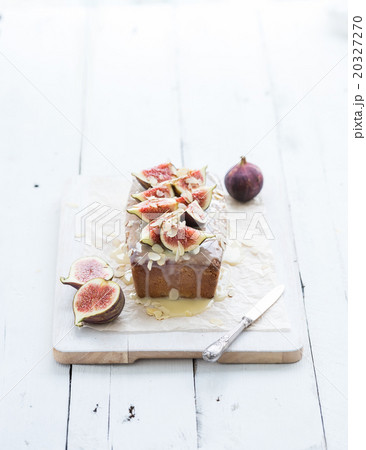 Loaf cake with figs, almond and white chocolate on 20327270