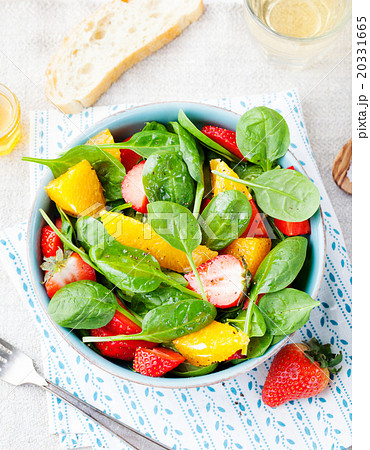 Fresh salad with strawberry, orange and spinach Fresh salad with strawberry, orange and spinach 20331665
