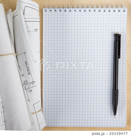 Architectural blueprints and blueprint rolls on 20339477