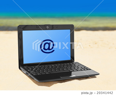 Notebook on beach Notebook on beach 20341442