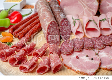 smoked meat on wood isolated white background 20342150