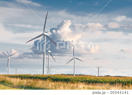 Wind turbine farm on rural terrain 20343141