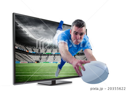 Composite image of a rugby player scoring a try 20355622